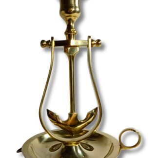 candelero basculante en latón con forma ancla para pared o mesa